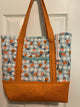 Teal gingham with oranges, orange polka dot base/straps