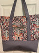 Multi color paisley with gray base/straps/interior